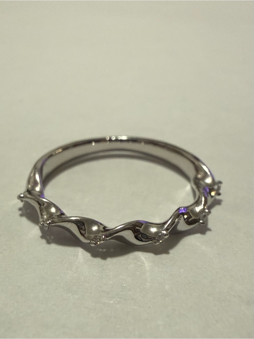 Rhodium Electroplated Wave With Small Cz Stones Band Stackable Ring